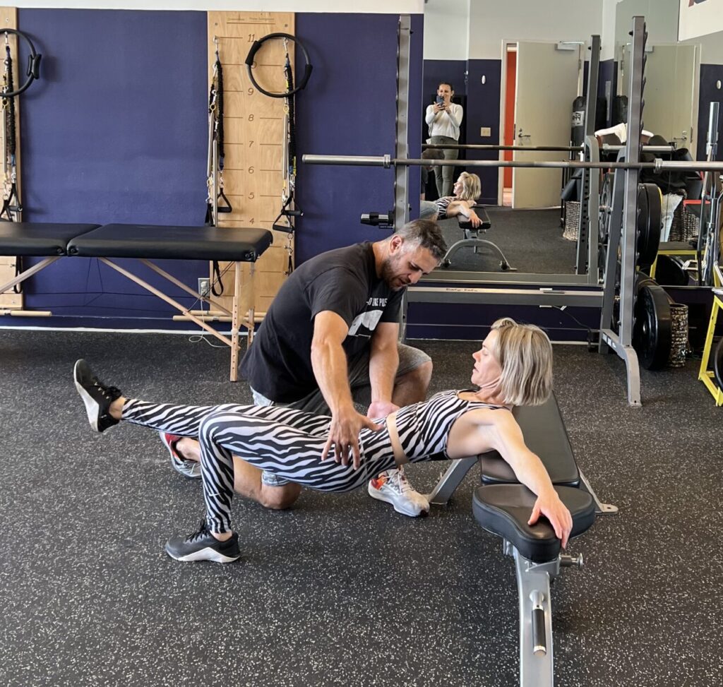 PERSONAL TRAINING being done by an instructor.